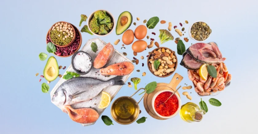 eine Auswahl Omega 3 haltiger Lebensmittel wie Fisch und Avocado, die EPA und DHA enthalten